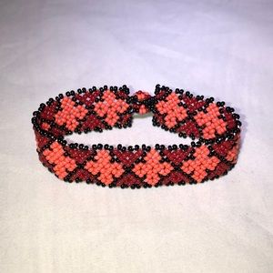 Tribal Designs Peach Cross Bracelet